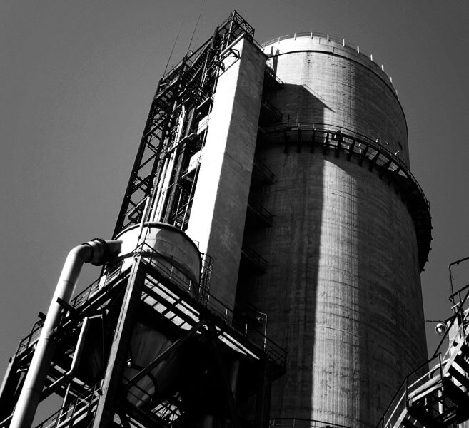 Black and white close up image of abrasives production tower